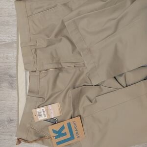 New with tags! Straight fit khakis. Life khakis by Haggar.
